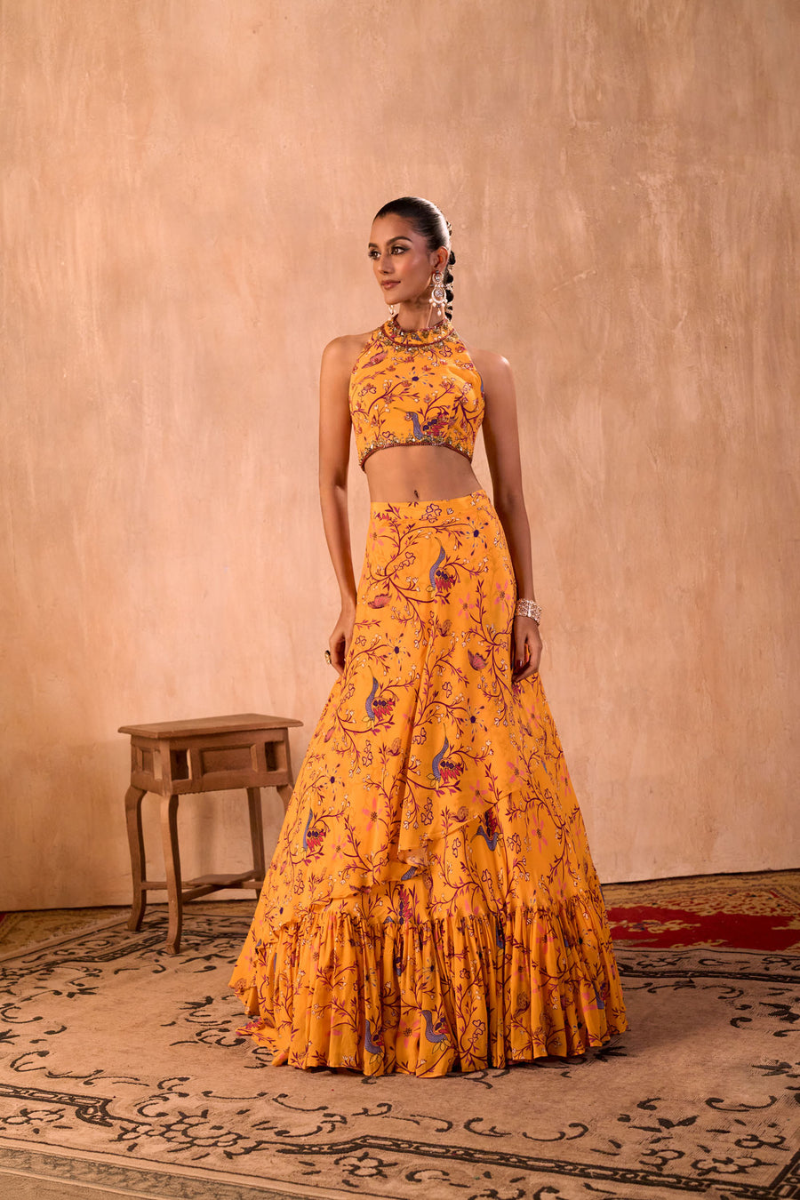 Yellow Print Embroidered Halter Choli And Layered Lehenga Skirt Set