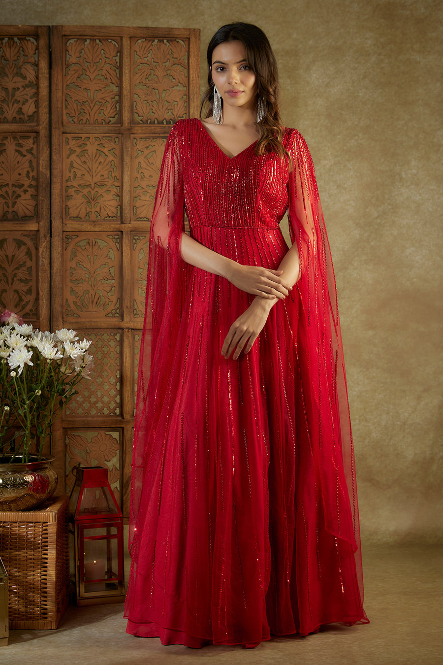 Red embroidered cocktail gown with cape sleeves