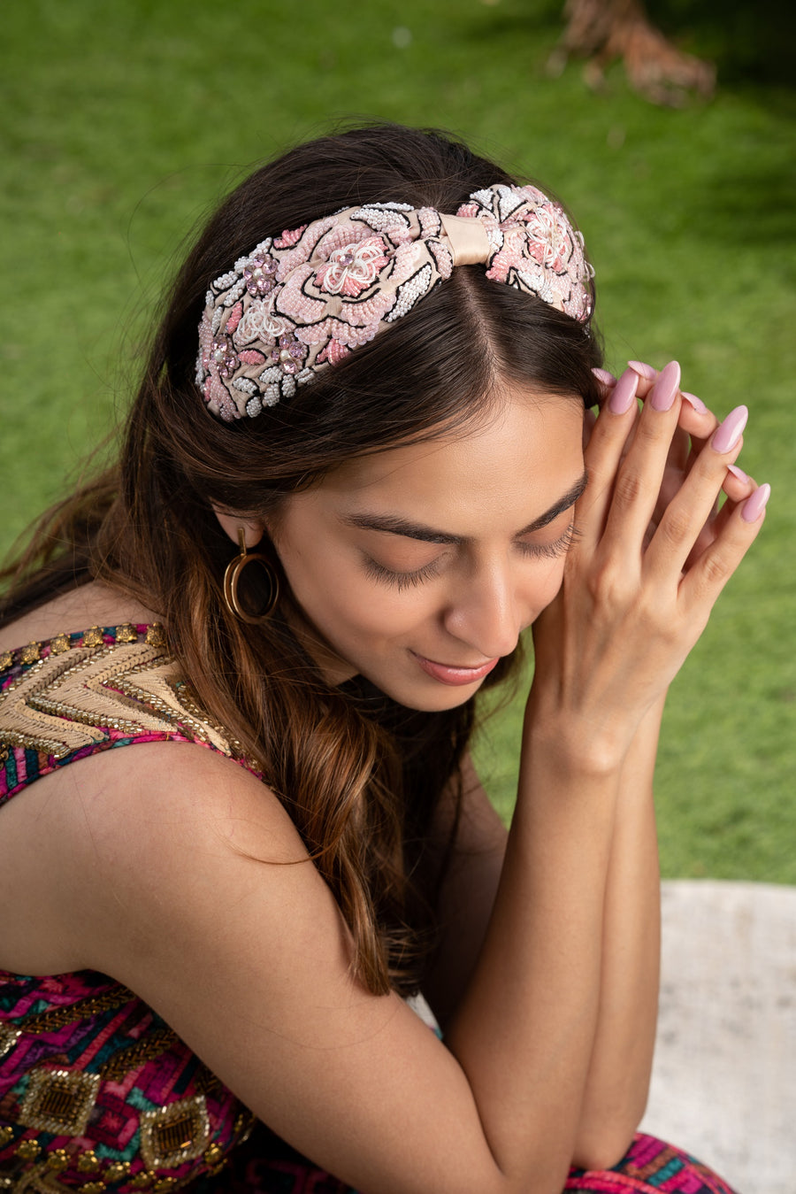 Pink Headband With Pink And White Embellishments