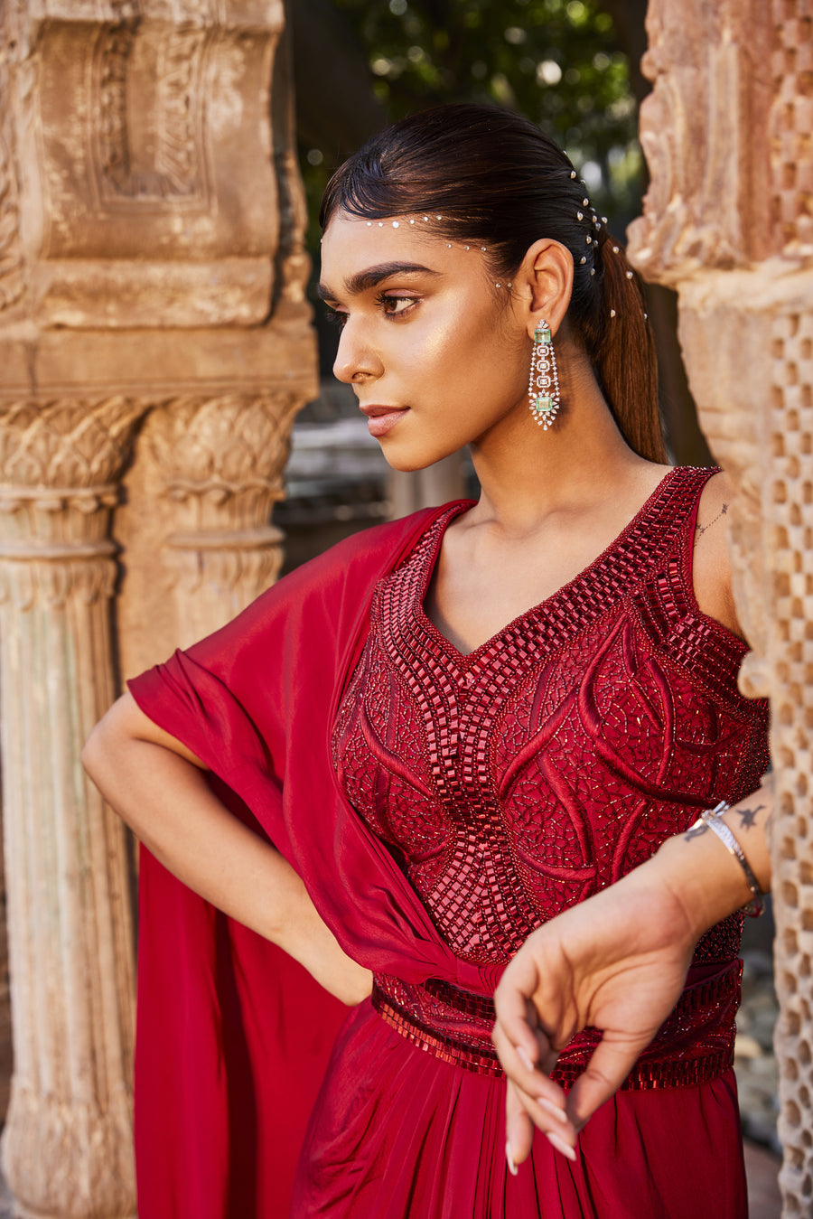 Young Woman in an elegant Red Saree Dress Posing Outdoors · Free Stock Photo